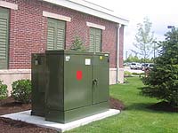 Good landscaping around a commercial transformer