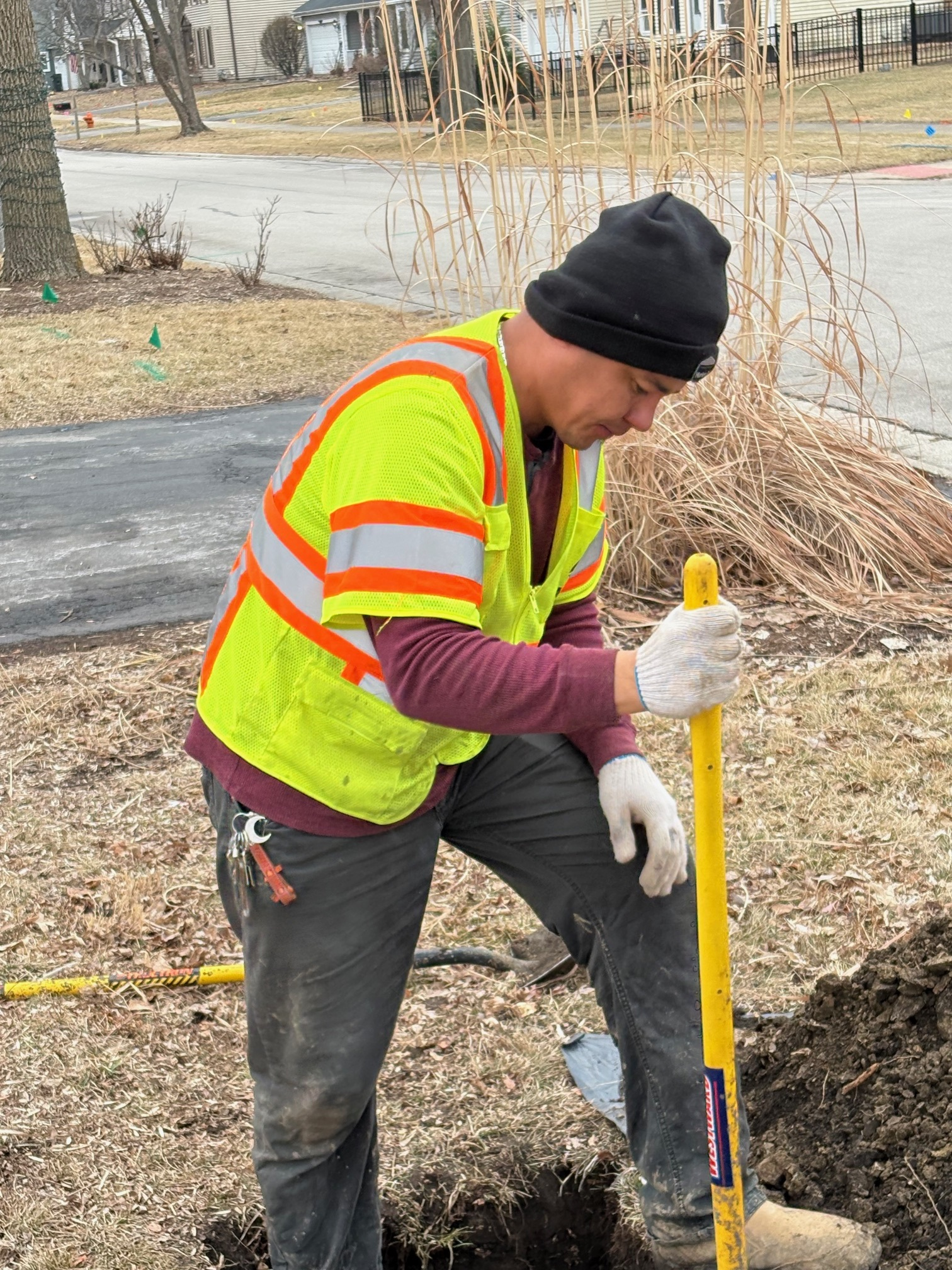 Man installing fiber in right of way in Naperville.