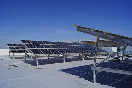 solar panels lined up on a roof