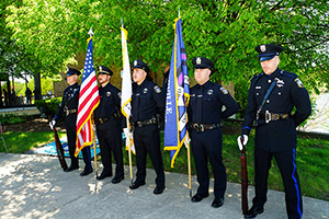 Members of the Naperville Police Department Honor Guard stand at attention.