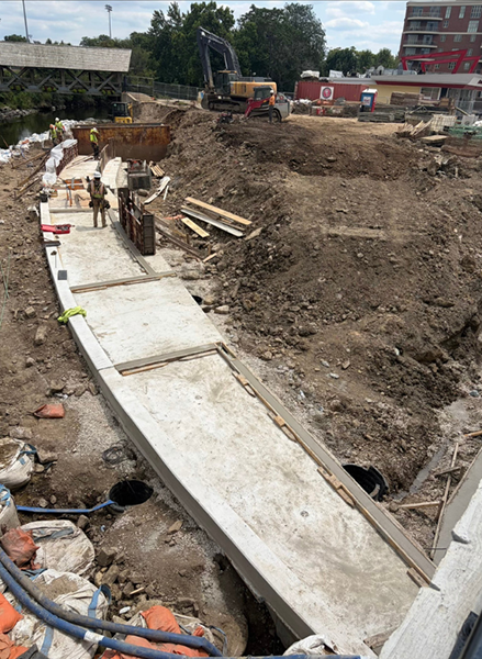 The new path along the DuPage River will connect to the Moser Covered Bridge.